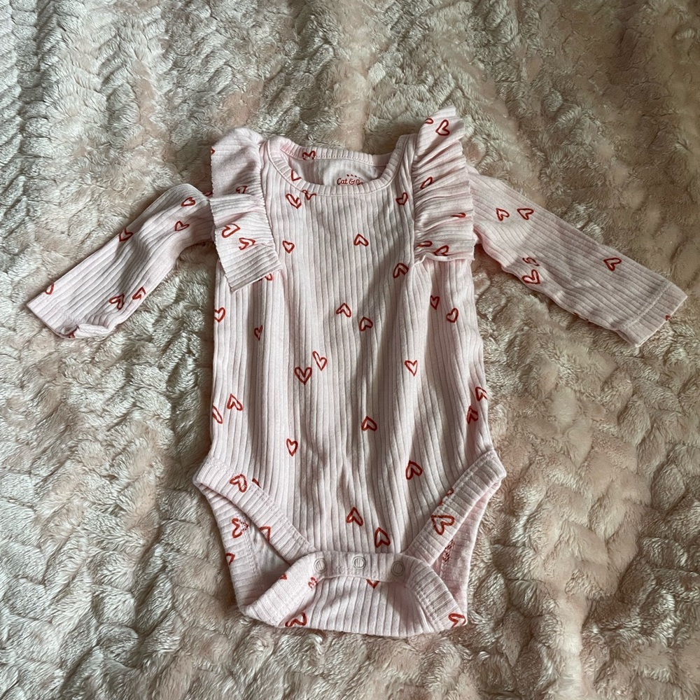 Pink onesie w/ hearts